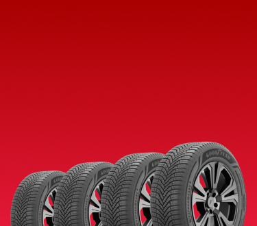 Four Tires on Red Background